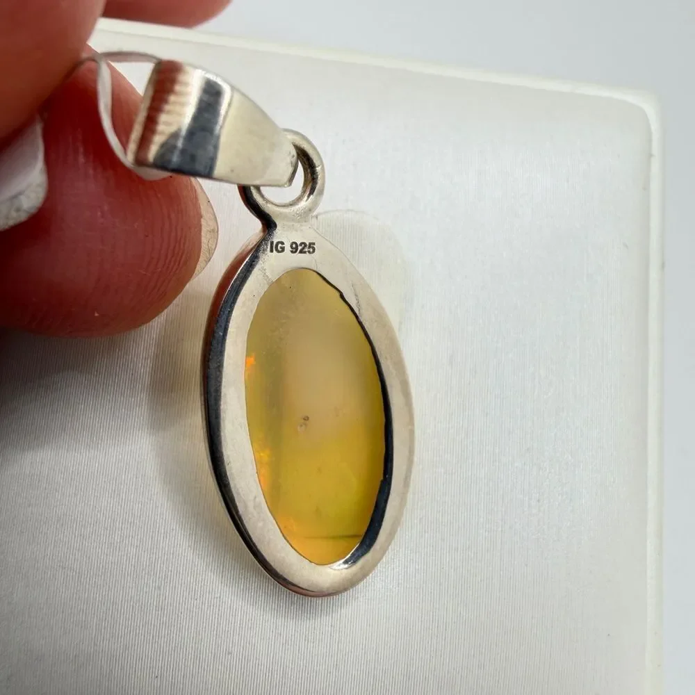 NWT‎ 12x22mm faceted oval cut OPAL pendant in sterling silver!